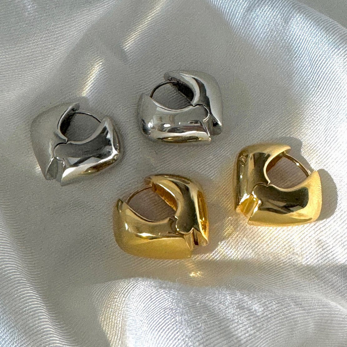 Grasp Earrings in Gold