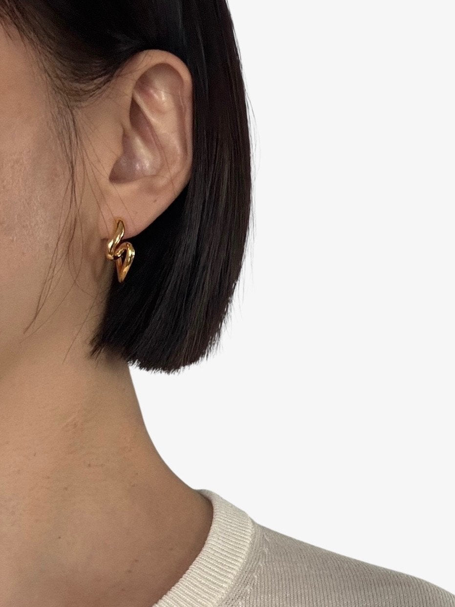 Grata Earrings in Silver