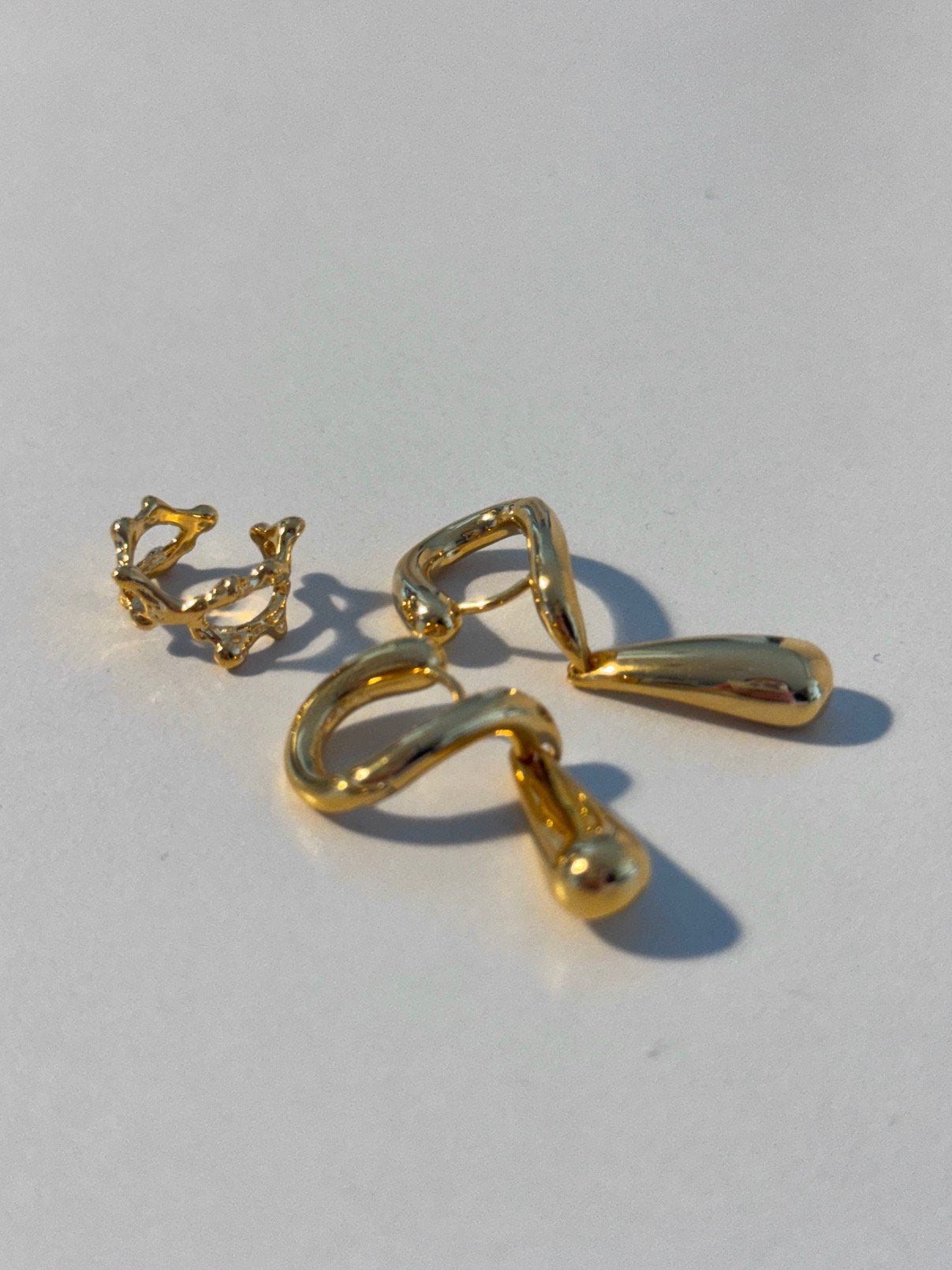 CXD earrings in Silver