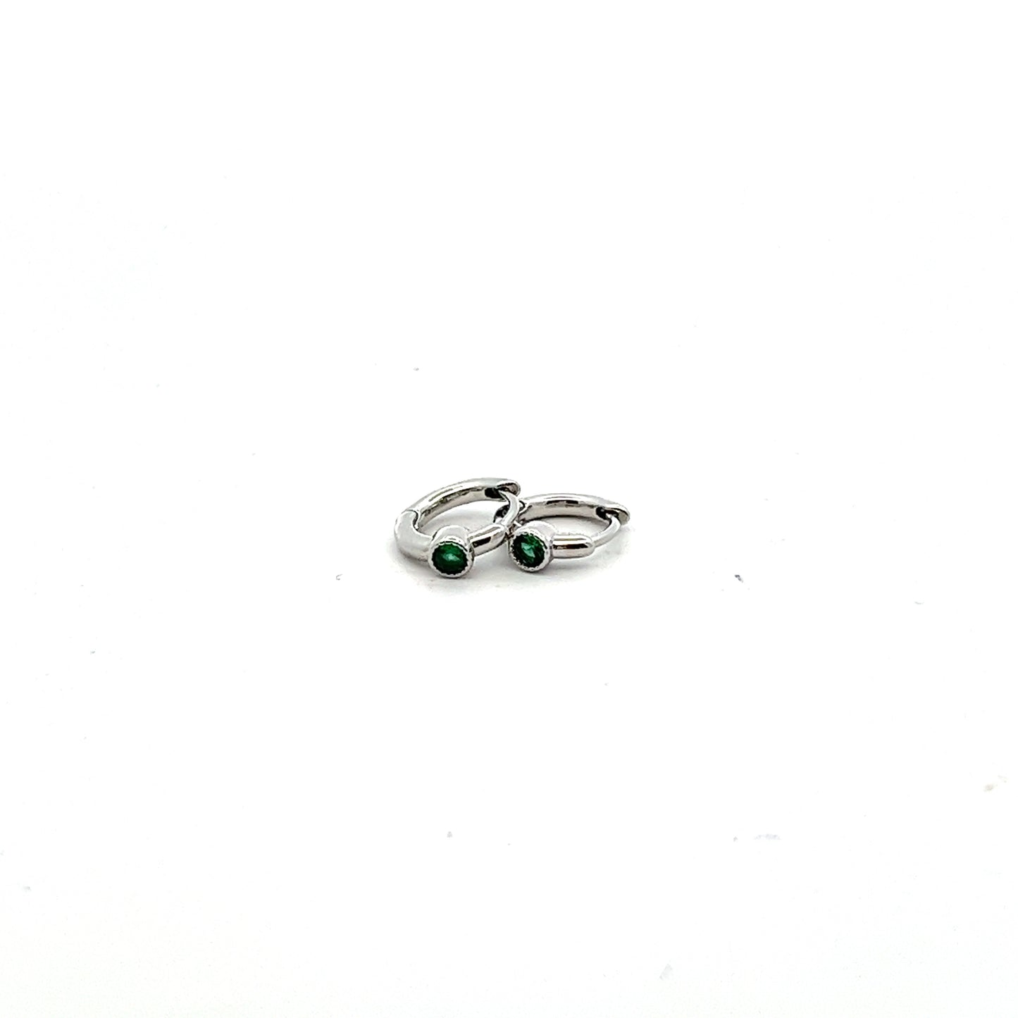 Soli Emerald Huggies Earrings In Sliver